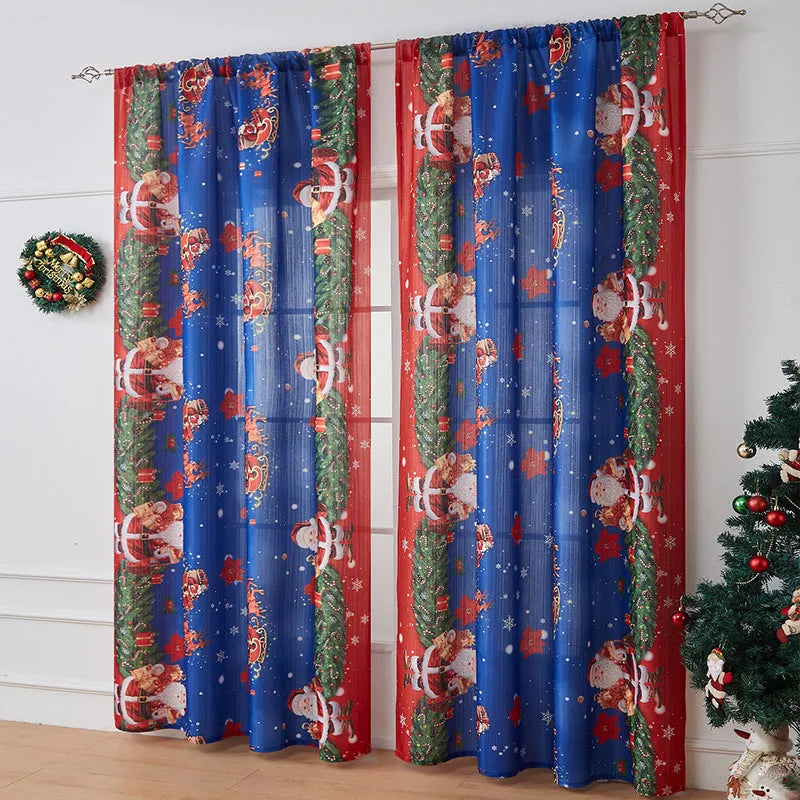 Rectangular printed polyester curtain with festive design hanging in a window