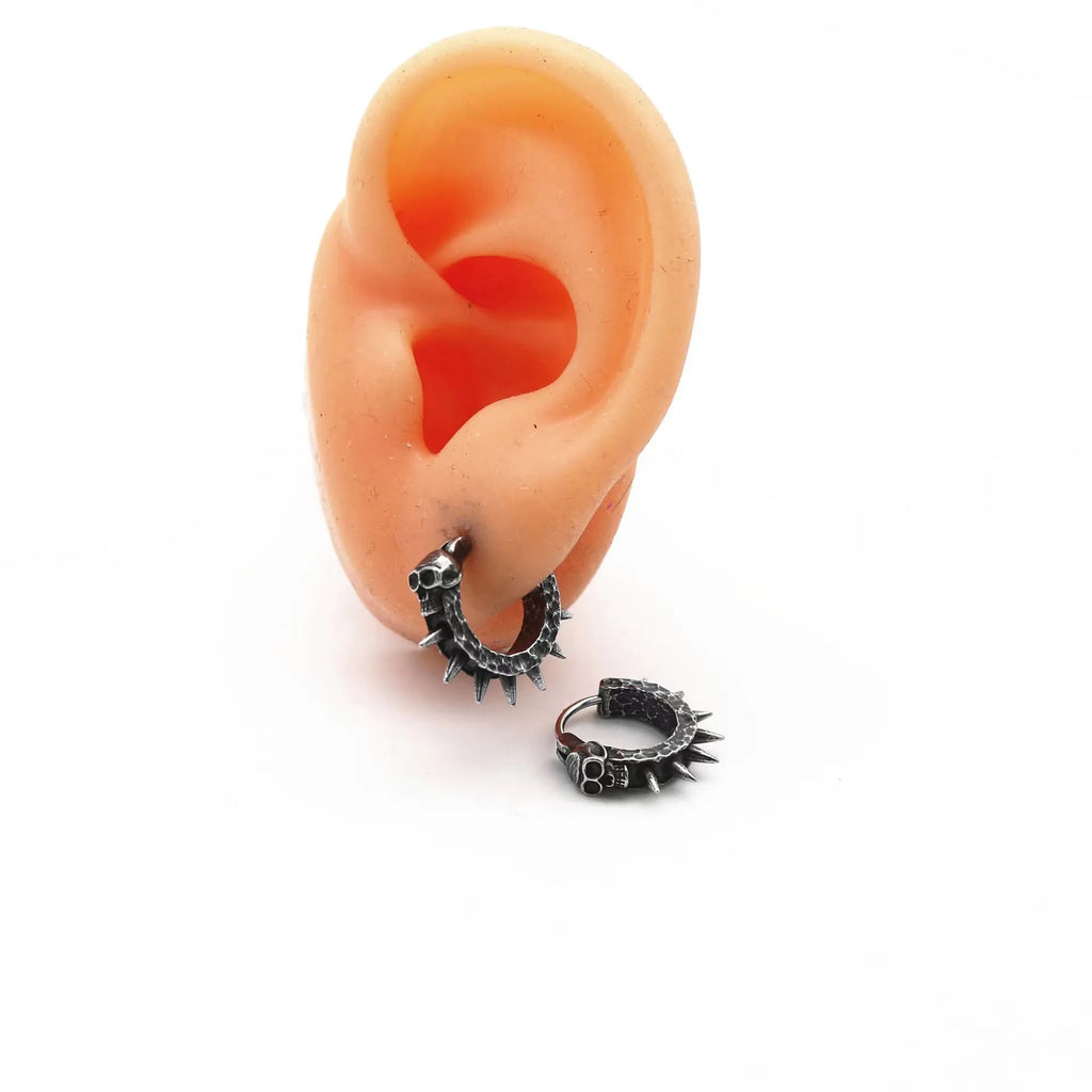 Black geometric alloy earrings with motorcycle theme and copper plastic punk detailing