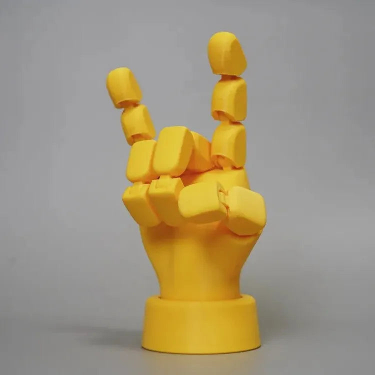 Yellow movable joint hand ornament prop for model figurines.
