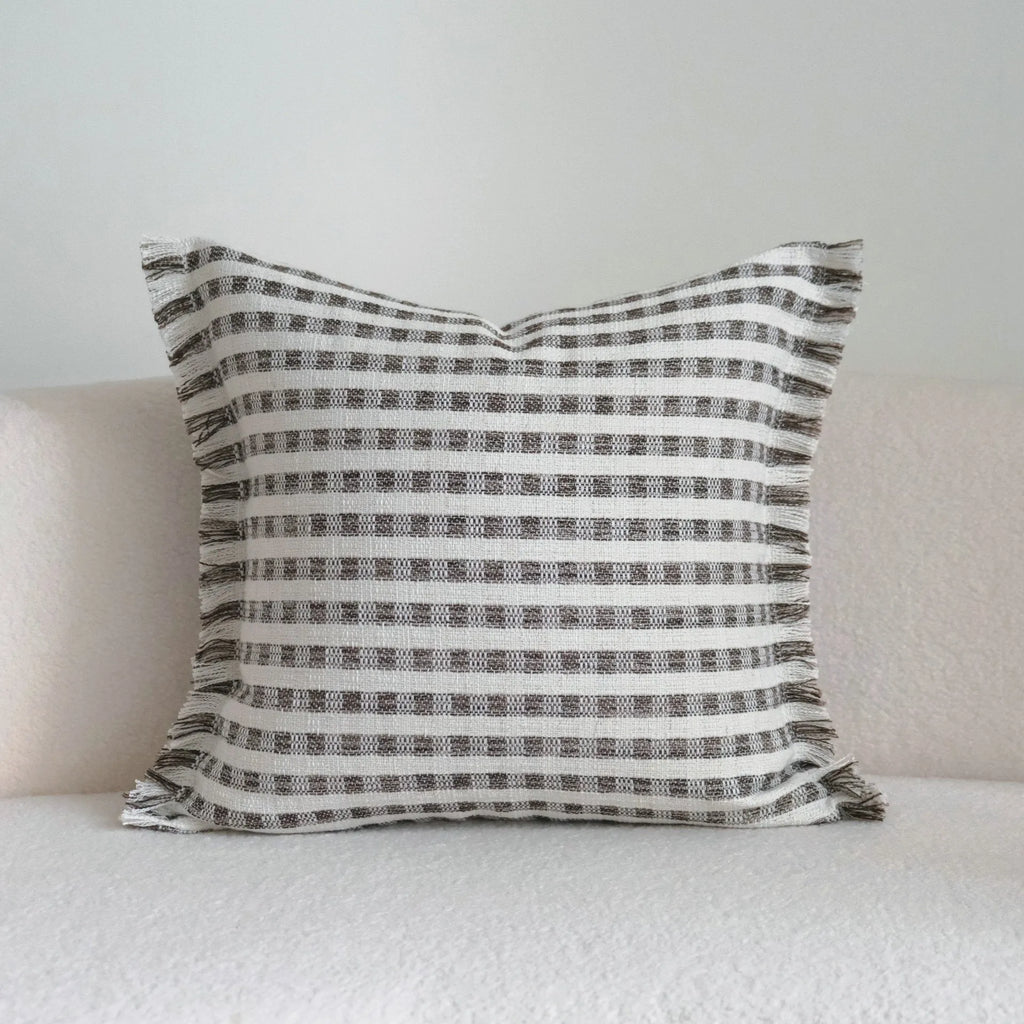 Coffee brown mid-century modern striped cushion on a sofa, showing 30x50cm and 45x45cm size options.