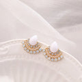 Women's retro fan-shaped silver stud earrings with rhinestones on a geometric alloy design.