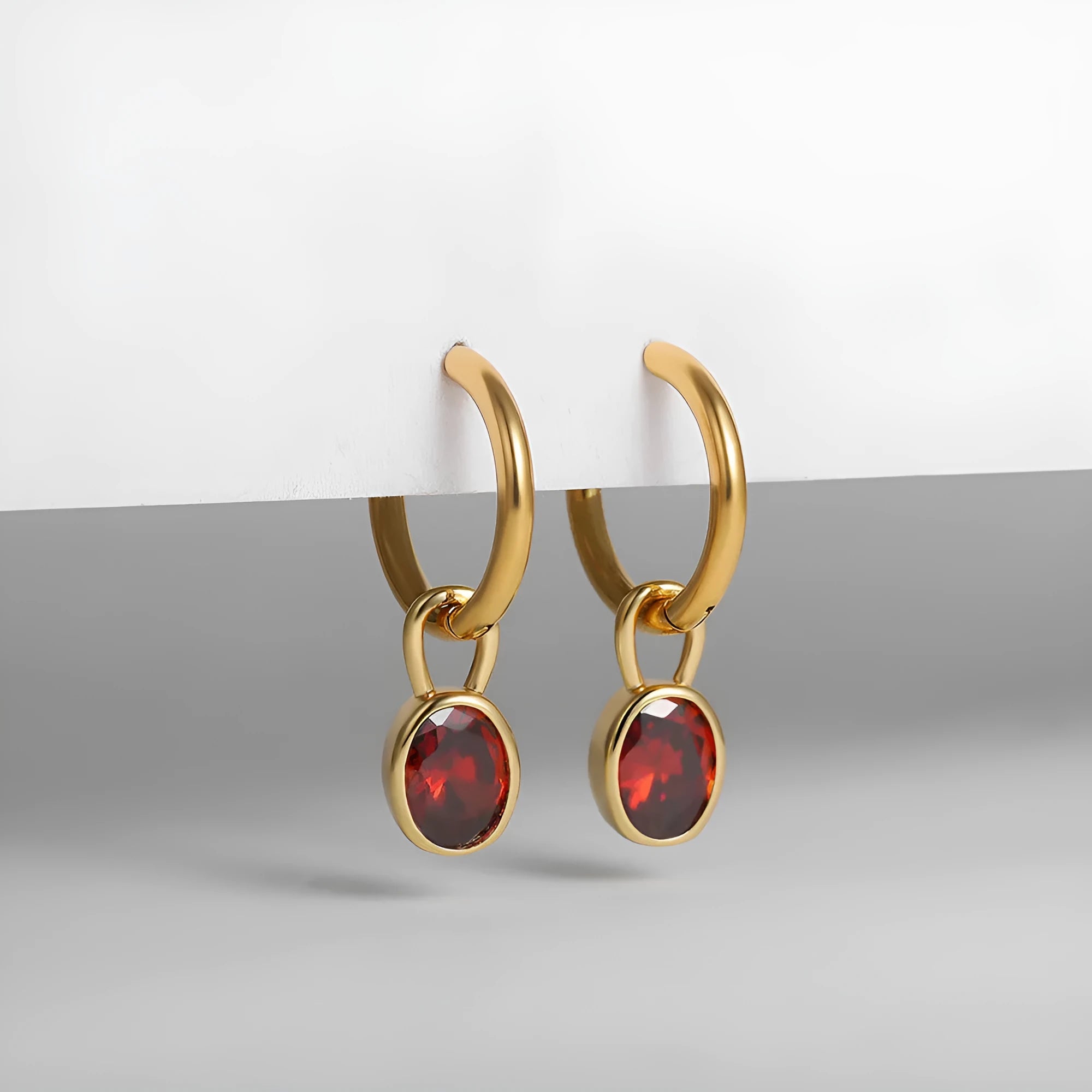 Women's retro simple oval zircon earrings in copper alloy, shown in an Emerald green colour.