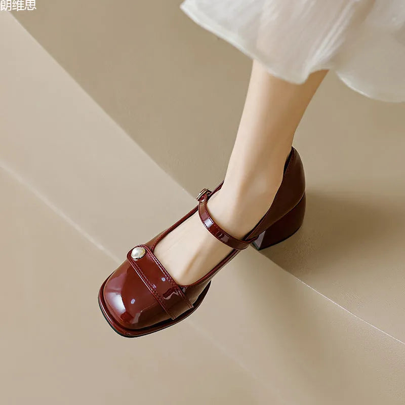 Women's plus size apricot patent leather chunky heel hiking shoe with buckle fastening and square toe.
