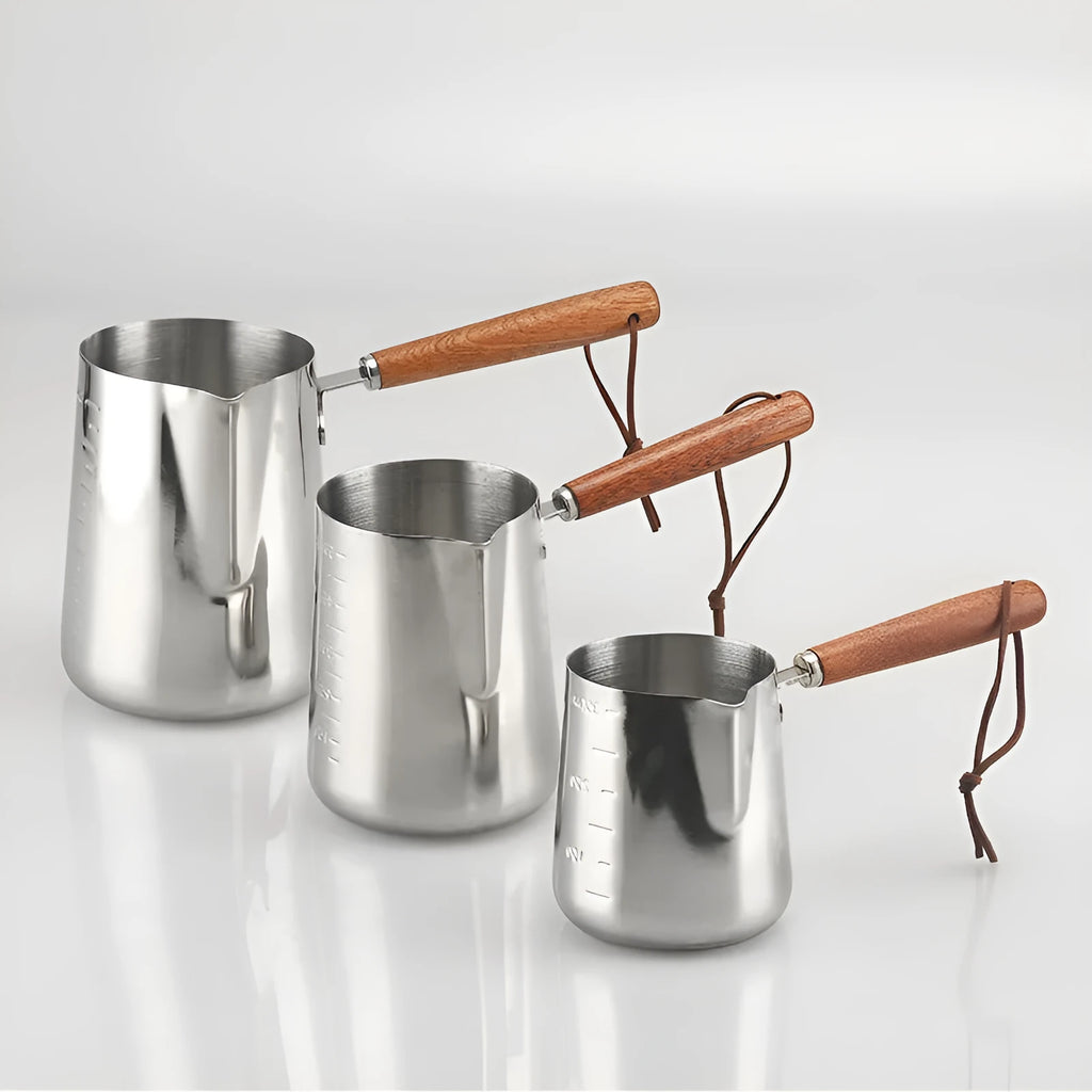 Stainless steel latte art milk jug with wooden handle in 350ml, 600ml, or 1000ml capacity options