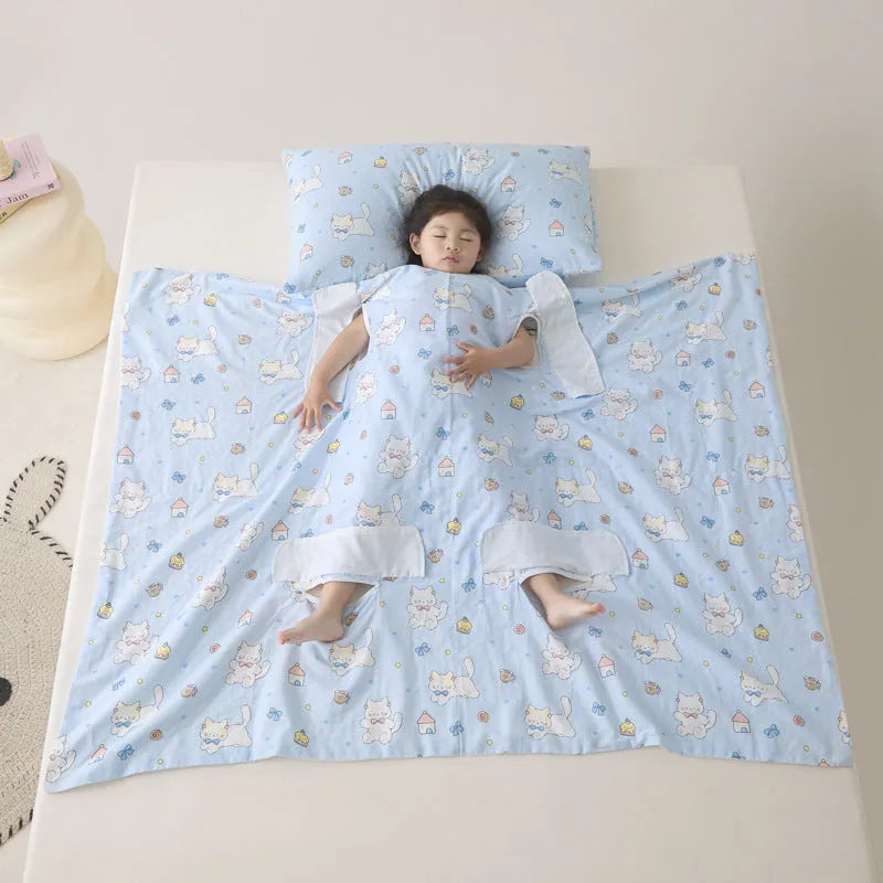 Patterned anti-kick sleeping bag blanket laid flat on a bed, showing its quilted texture.