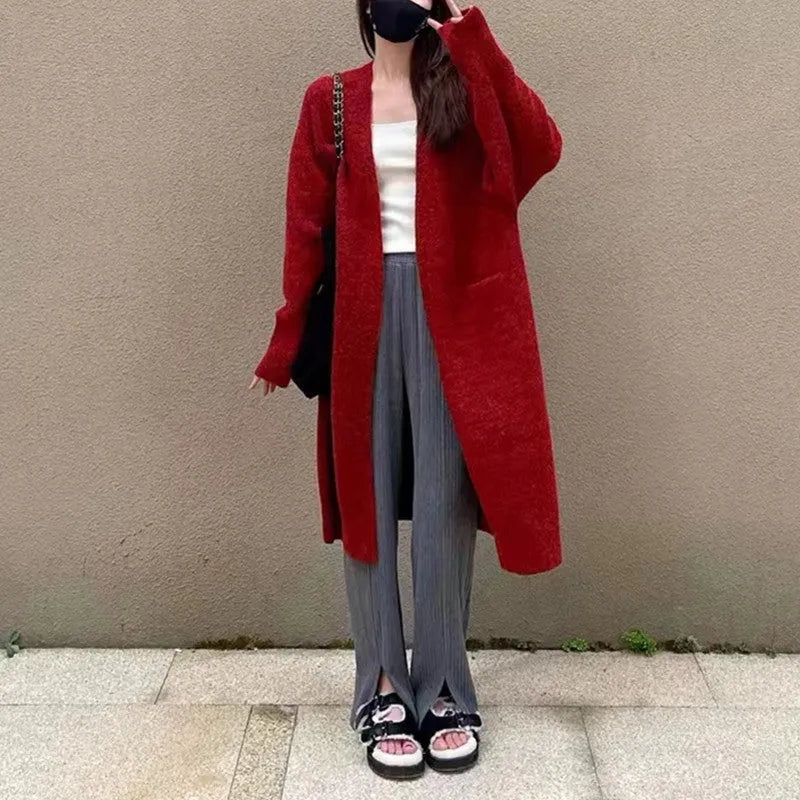 Women's mid-length loose fit knitted cardigan coat in solid colour with pockets, 65cm long, acrylic blend