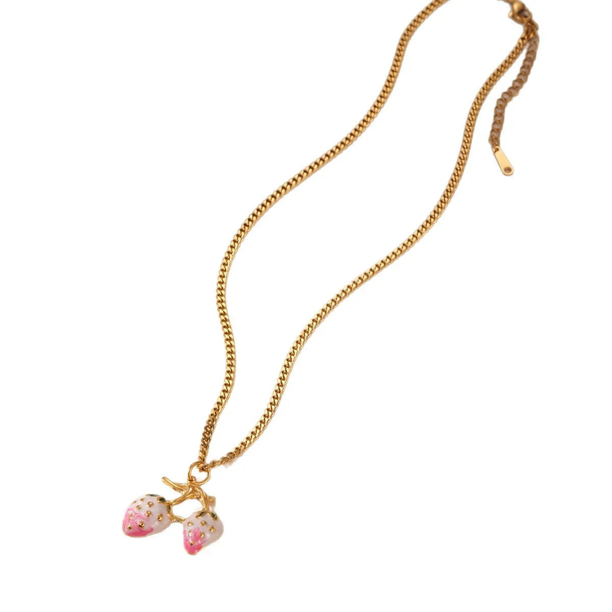 Alloy strawberry fruit pendant necklace on stainless steel chain with red charm and white gradient background.