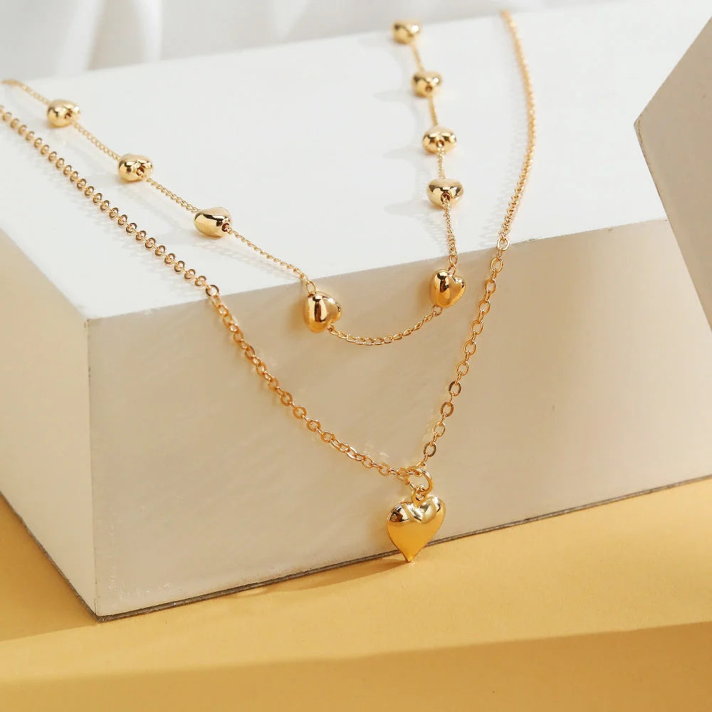 Double-layer heart pendant fine chain necklace in gold colour with adjustable length