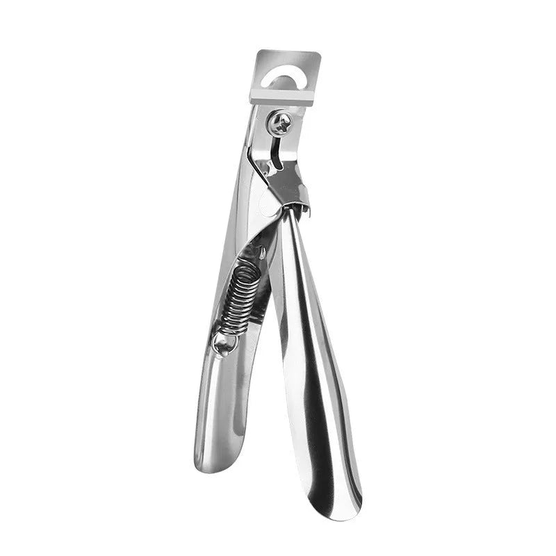 Close-up of stainless steel French U-shaped nail scissors on a plain background.