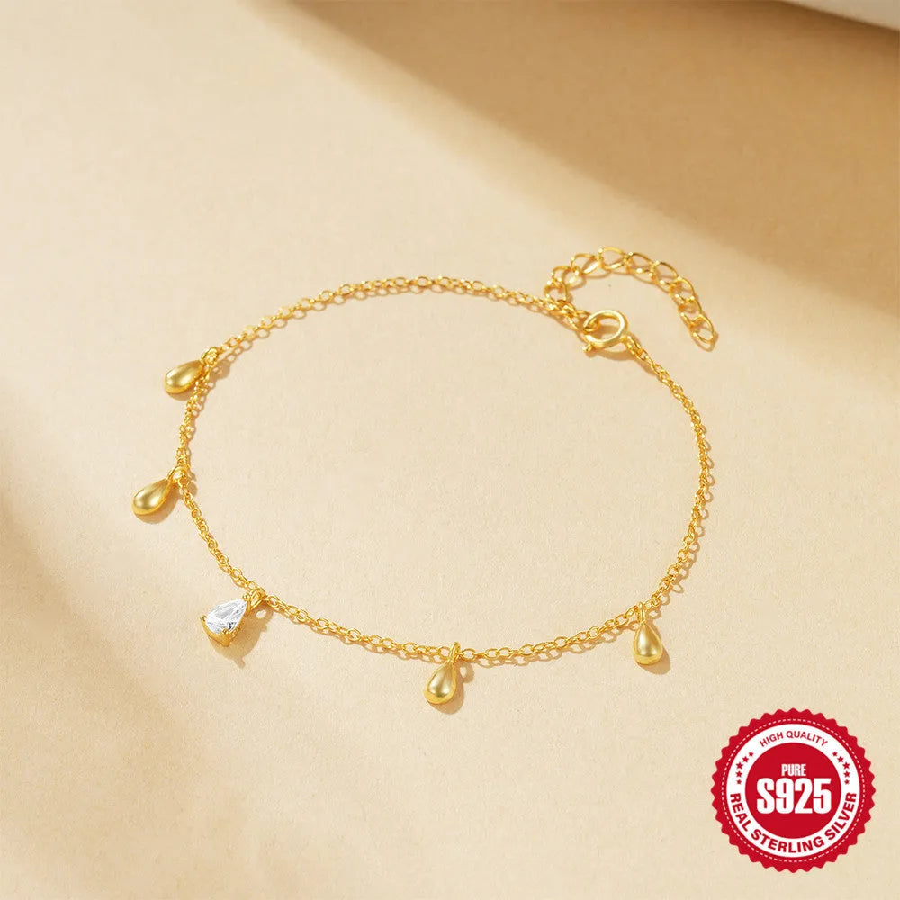 Water drop diamond geometric pendant on S925 sterling silver adjustable bracelet with gold colour finish