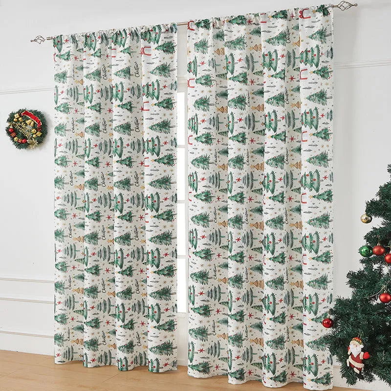 Rectangular printed polyester curtain with festive design hanging in a window