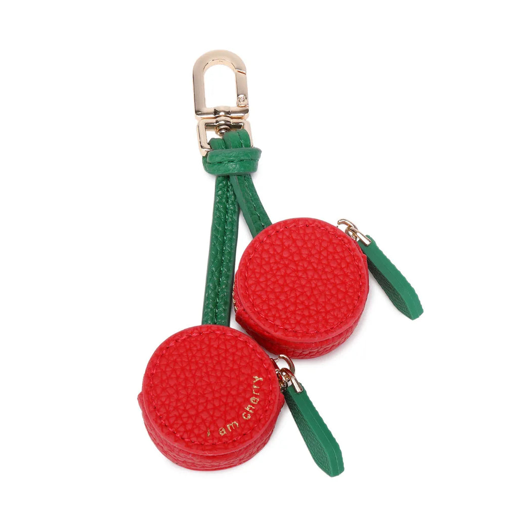 PU leather mini coin bag on a keychain in cherry, blueberry, or orange colour