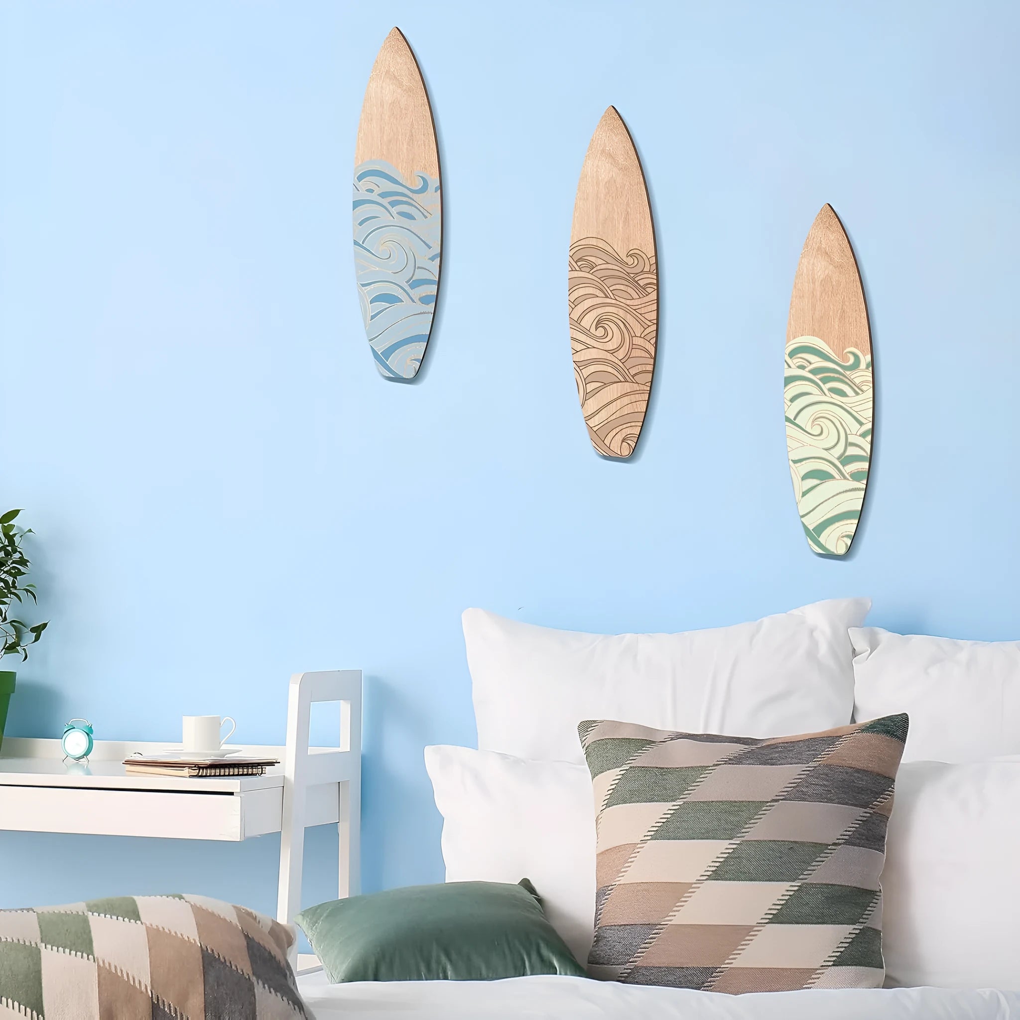 Three identical wooden surfboard wall decorations displayed together