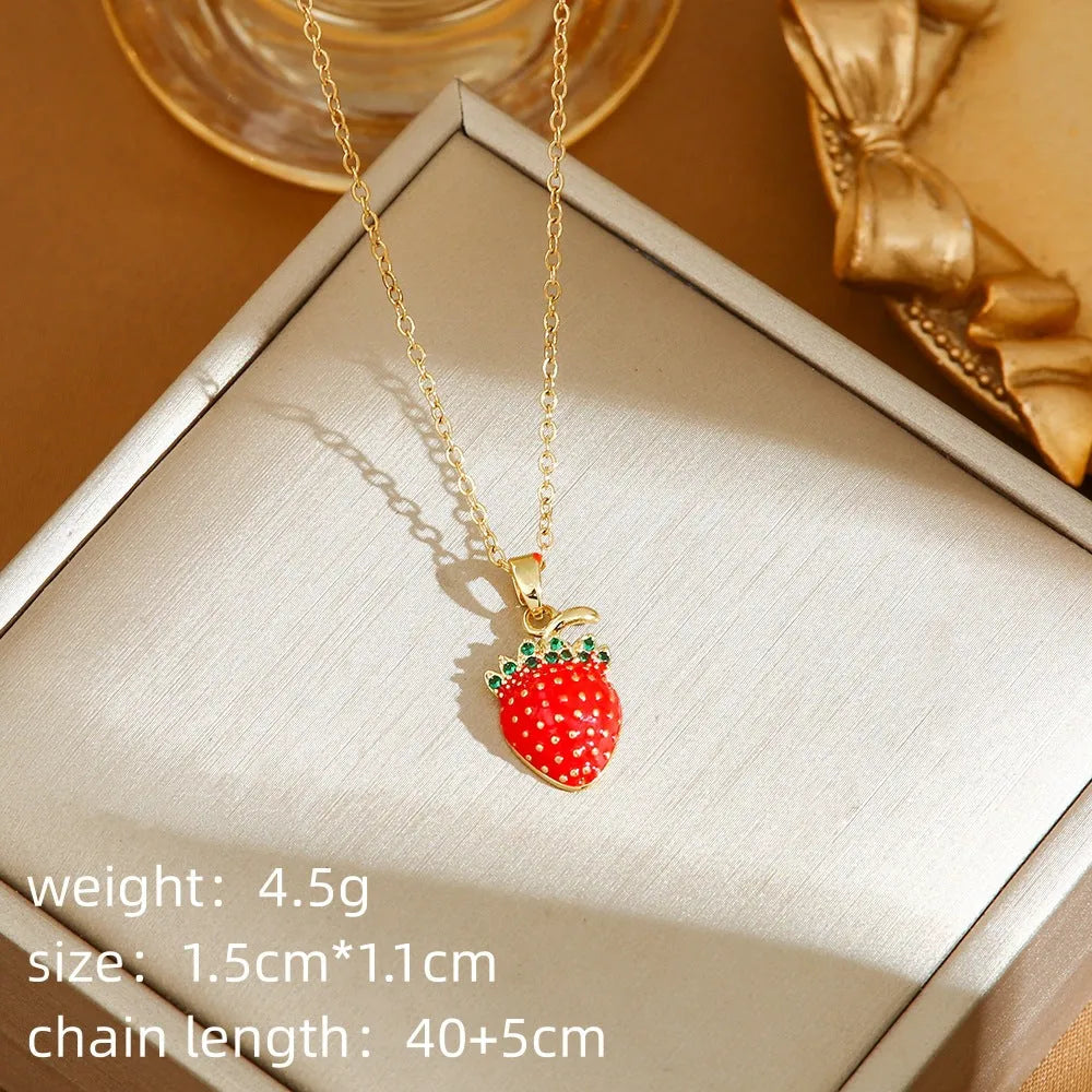 Titanium steel necklace with a delicate cherry charm on an O-ring chain.