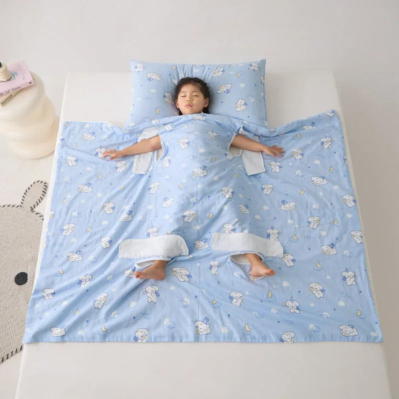 Patterned anti-kick sleeping bag blanket laid flat on a bed, showing its quilted texture.