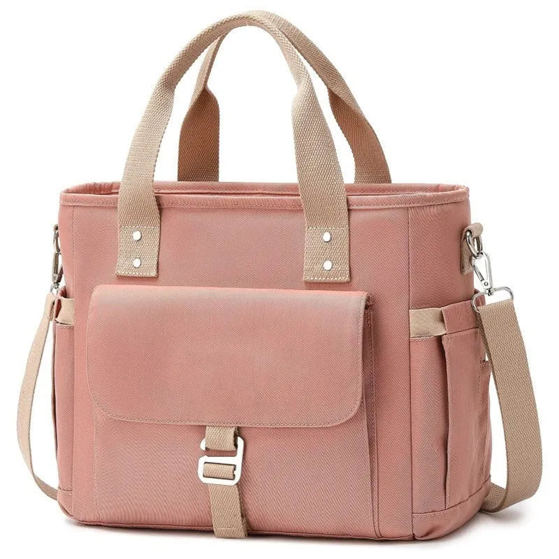 Insulated cube-shaped picnic bag with removable shoulder strap in pink colour with side pocket