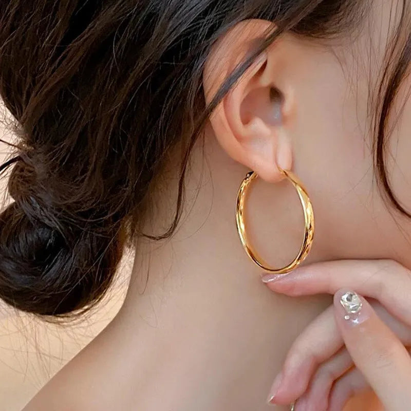 40mm circular hoop earrings in electroplated gold or silver finish