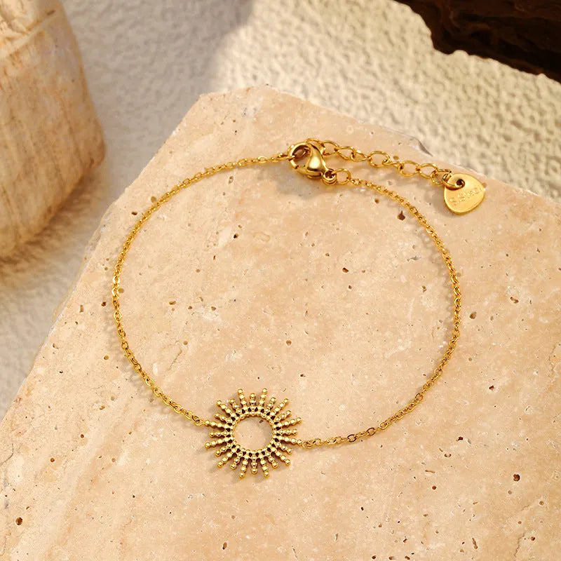 Sunflower series geometric gold chain necklace and bracelet set for women.