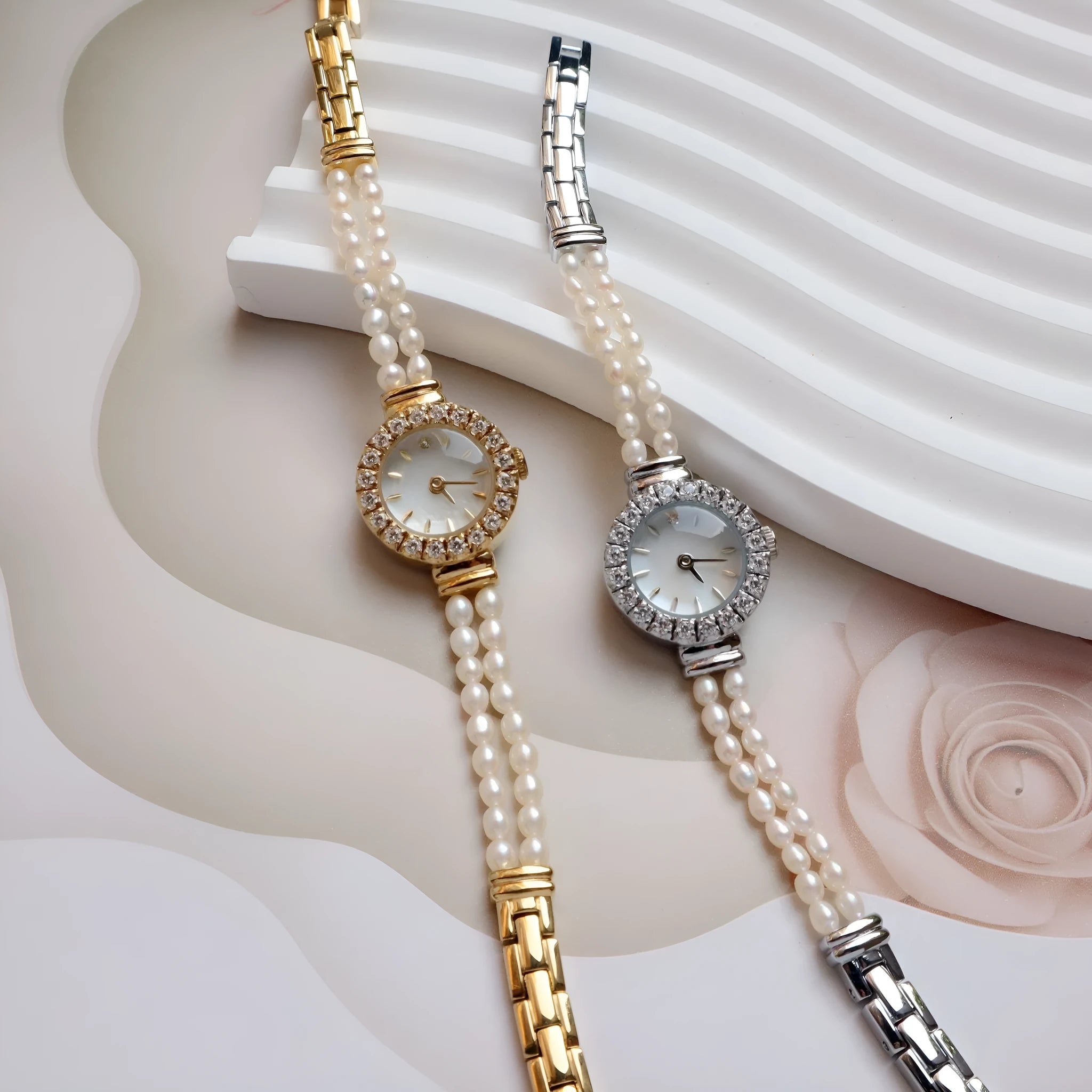 Light gold women's bracelet watch with freshwater pearls, round dial, and stainless steel strap
