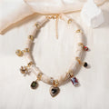 Heart-shaped resin bamboo necklace with electroplated finish in pictured colour