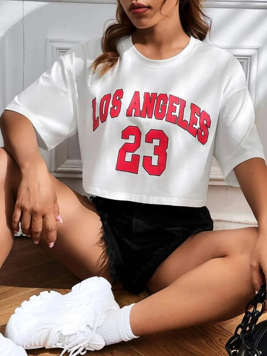 Women's black cotton t-shirt with white English letter printing and exposed navel design in casual Japanese Korean style