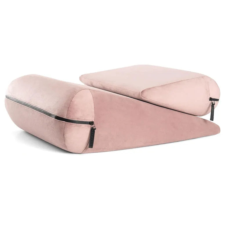 High-density sponge triangular furniture pillow in grey on a sofa corner.
