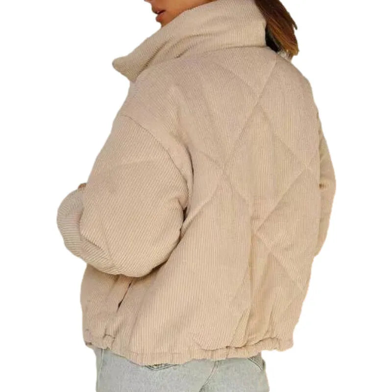 Apricot coloured women's corduroy jacket with a stand collar, front zipper, and long sleeves.