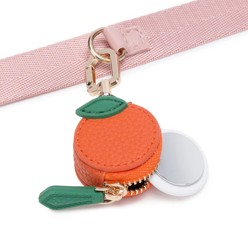 PU leather mini coin bag on a keychain in cherry, blueberry, or orange colour