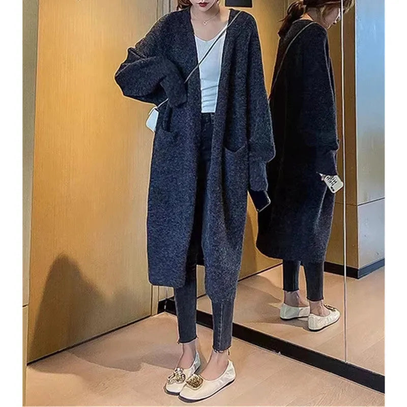 Women's mid-length loose fit knitted cardigan coat in solid colour with pockets, 65cm long, acrylic blend