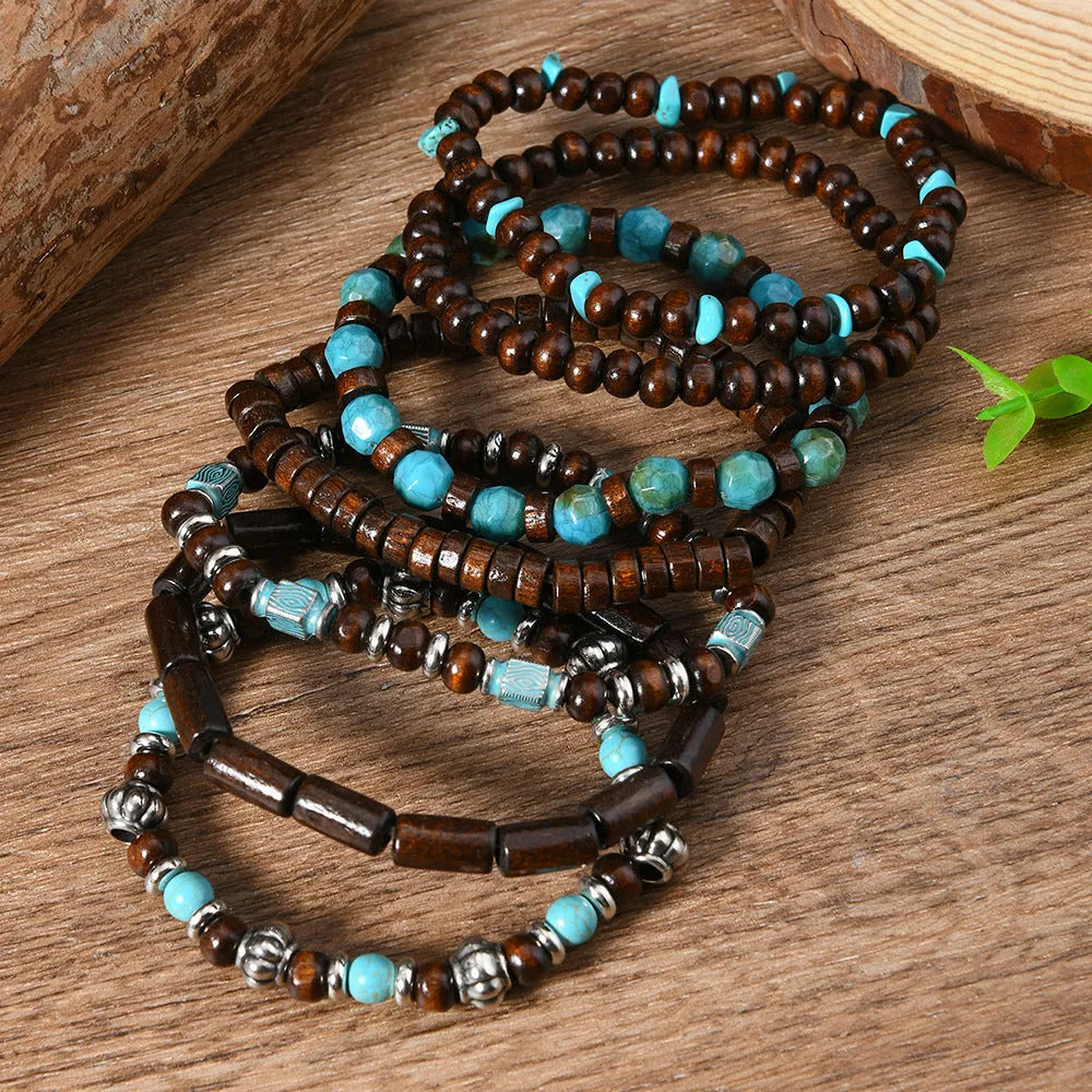 Set of seven retro bracelets with wooden beads and alloy charms in multicolour