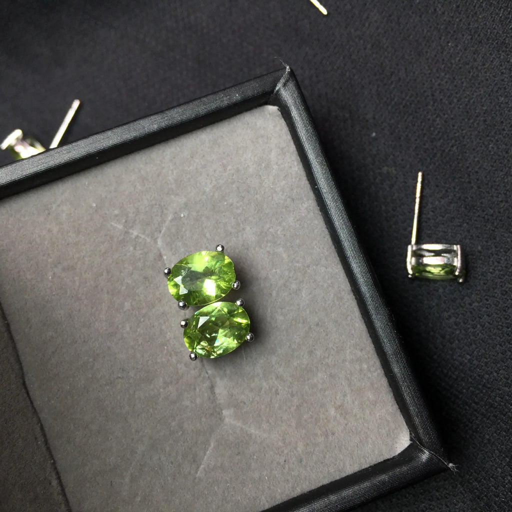 Natural grass green olivine faceted stud earrings in S925 silver setting, 6x8mm geometric ellipse shape
