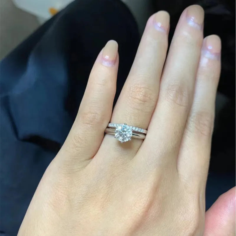 Adjustable heart-shaped moissanite couple ring with dragon, phoenix, and ten thousand words decorations on a silver-plated band.