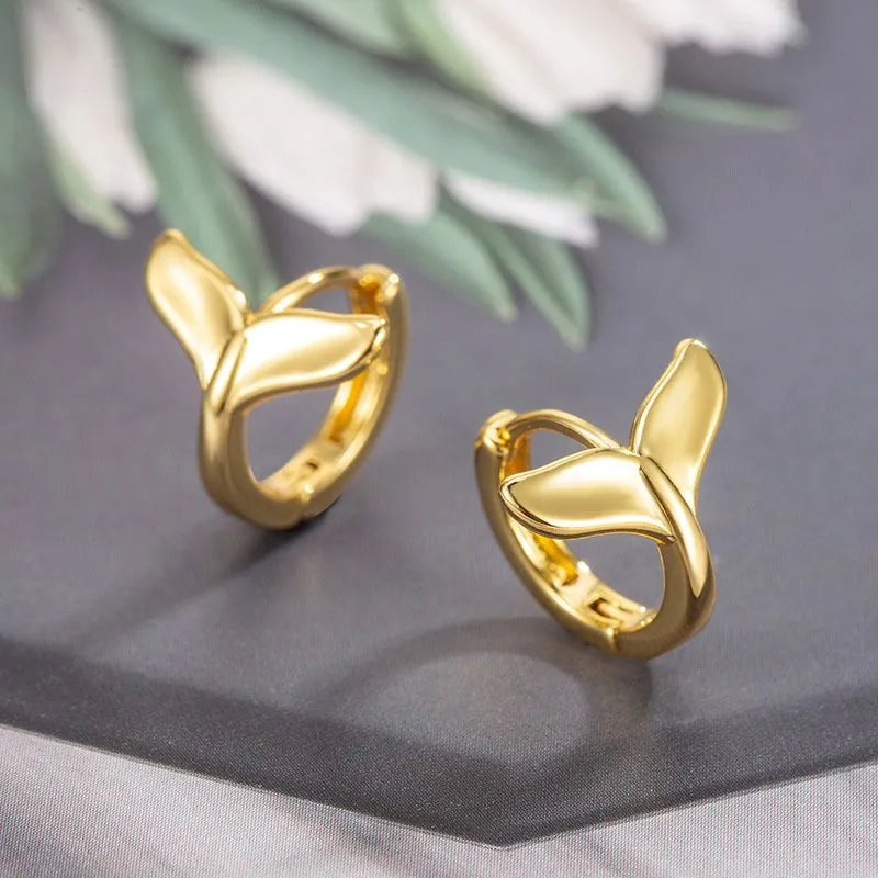 Women's fashion fishtail earrings in white gold or yellow gold electroplated finish