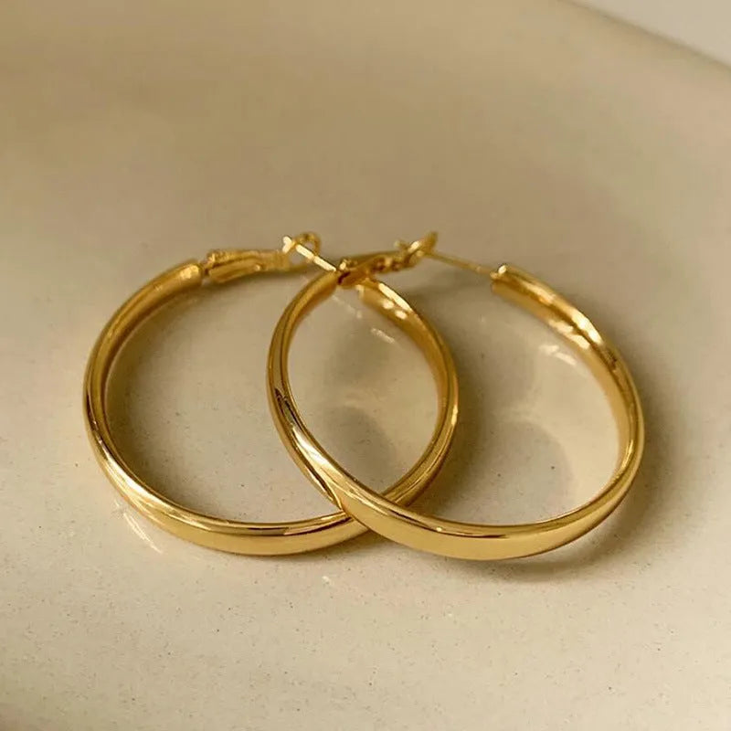 40mm circular hoop earrings in electroplated gold or silver finish