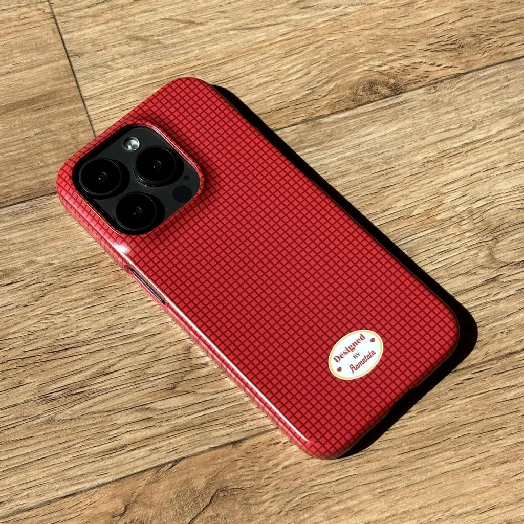iPhone 15 Pro Max phone case with red plaid design and anti-fingerprint finish.