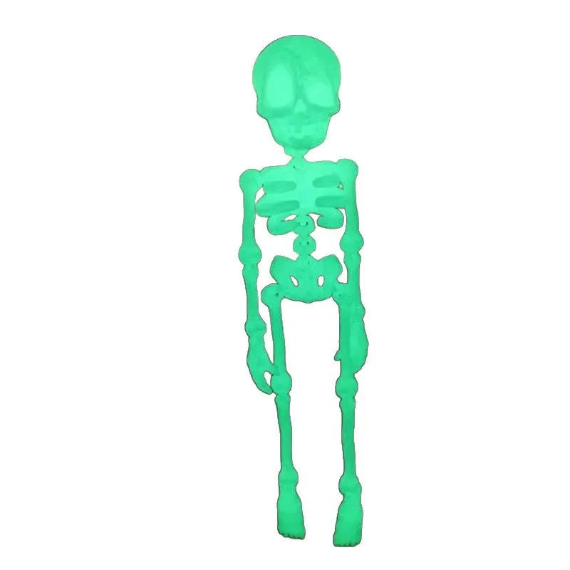 3D printed white skull refrigerator magnet ornament, 18cm tall, on a fridge door.