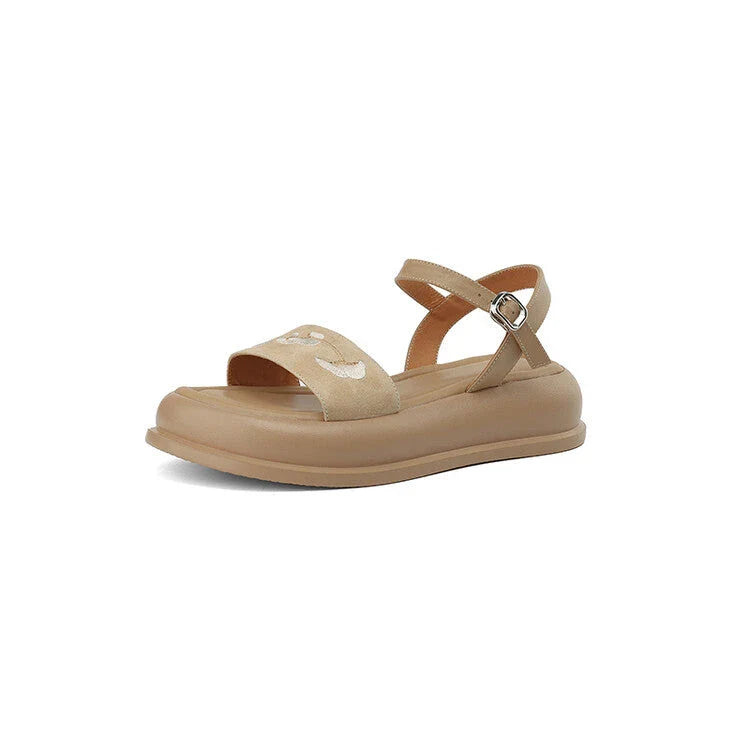 Embroidered platform sandals with kid suede upper and durable TPU outsole, designed for everyday comfort and style.