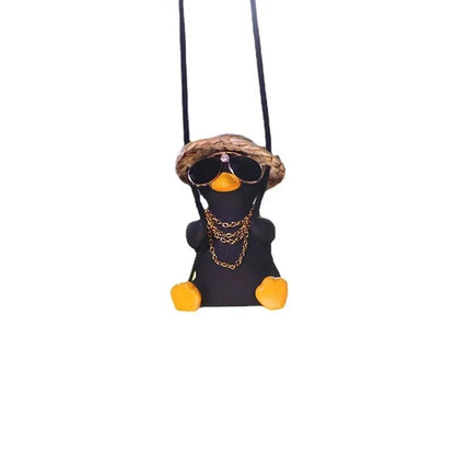 A charming swinging duck car pendant with a guitar and coke-themed design, adding a touch of Kiwi personality to your vehicle.