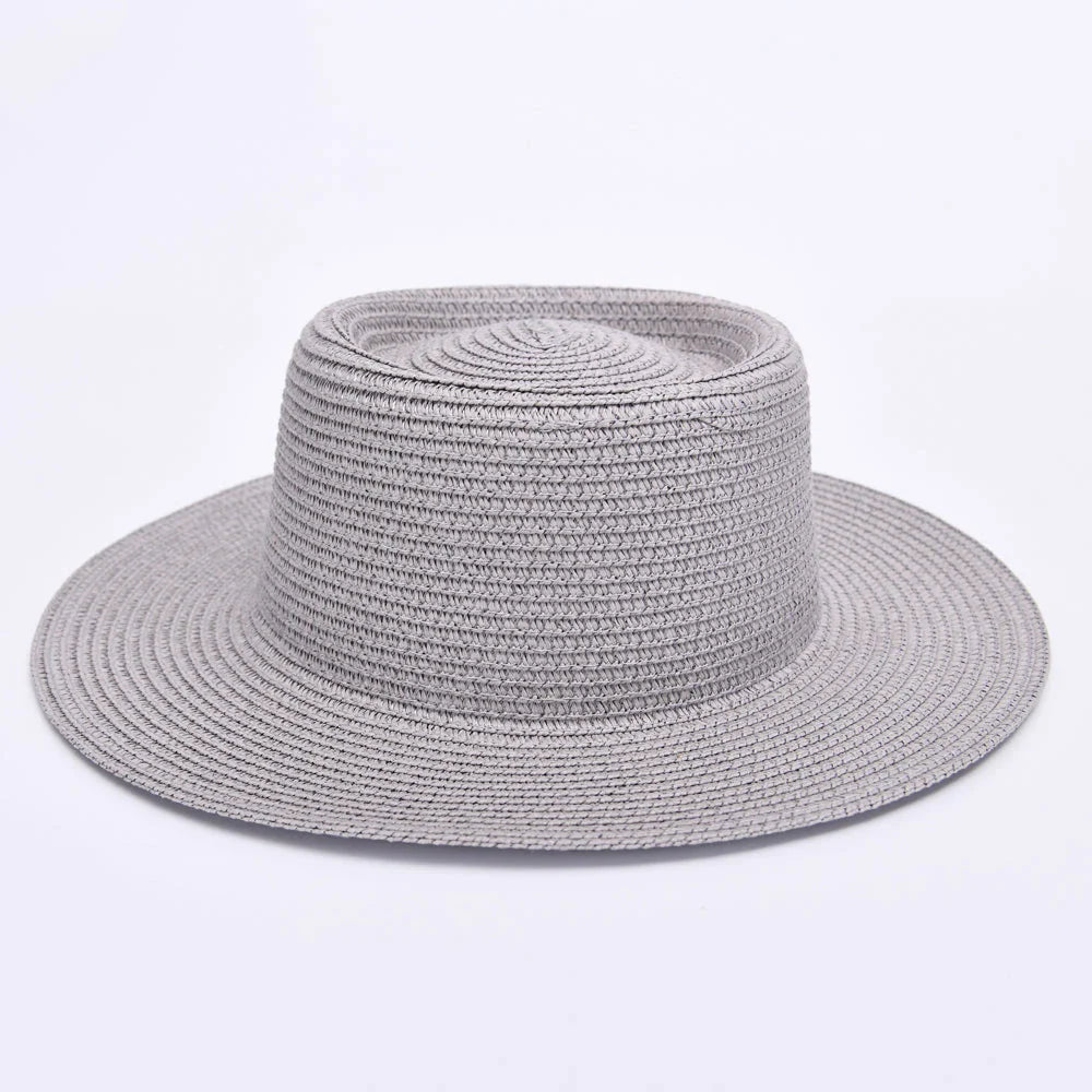 Elegant ladies' summer beach sun hat with wide brim, designed for sun protection and style in New Zealand