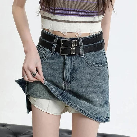 A stylish high-waisted denim mini skirt with a fashionable belt, perfect for Kiwi fashion enthusiasts