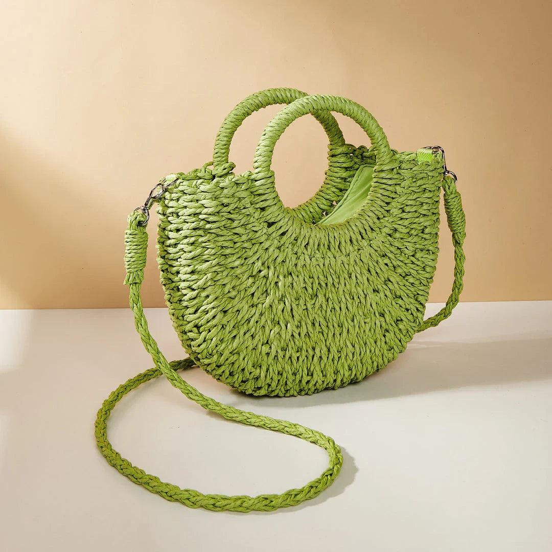 Stylish and eco-friendly straw woven beach bag for Kiwi women, featuring a unique half-moon shape, premium paper straw, and cotton lining.