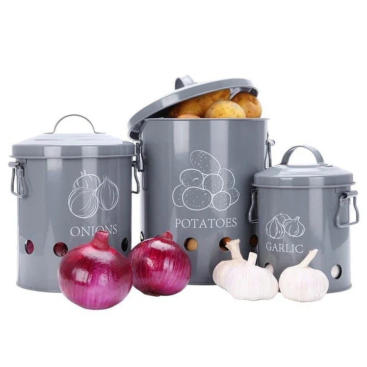 Breathable metal storage bins with handles for storing fresh produce like onions, potatoes and garlic in the kitchen.