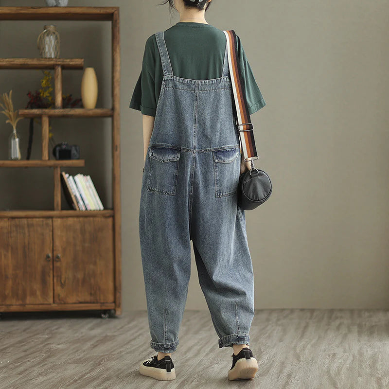 Trendy denim pants with embroidered straps for women, available in light blue color and various sizes from M to XXL