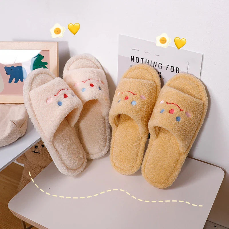 Cosy and cute smiling home slippers with plush upper and non-slip sole for Kiwi indoor comfort and style