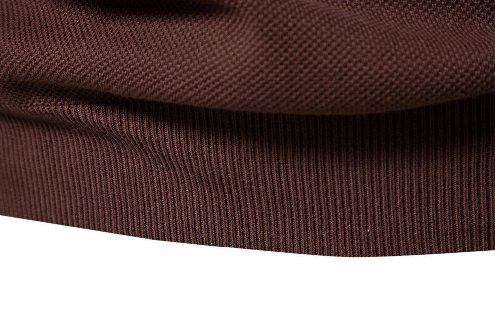 A stylish, slim-fit sweater in a modern colour-blocking design of Lake Green, White, and Grey, made with premium cotton for exceptional comfort and New Zealand casual style.