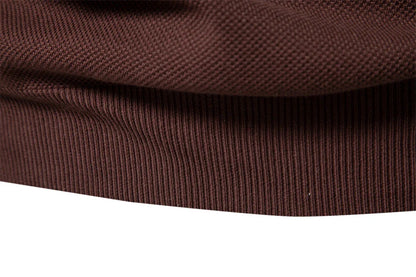 A stylish, slim-fit sweater in a modern colour-blocking design of Lake Green, White, and Grey, made with premium cotton for exceptional comfort and New Zealand casual style.