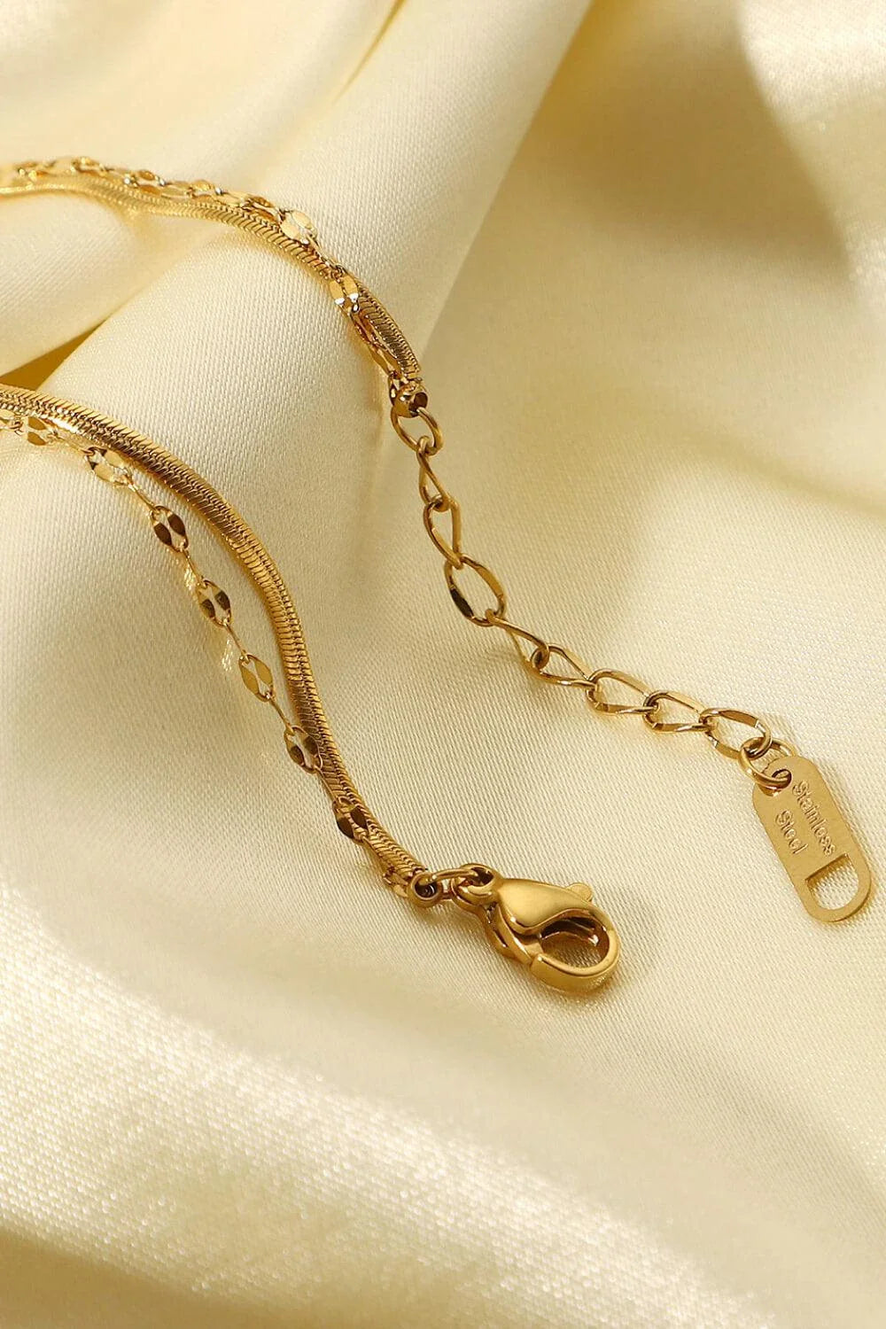 Sparkling double-layered stainless steel bracelet with rhinestone embellishments, adjustable fit for all-day comfort and style