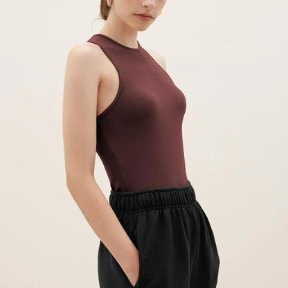 Stylish summer bodycon tank top for Kiwi women, featuring a comfortable and flattering design in a classic beige color.