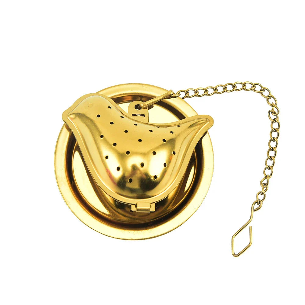 Gold pendant tea infuser with stainless steel construction and an elegant, modern design