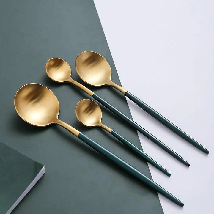 A set of eco-friendly, minimalist tableware in green and gold colors, suitable for 4 diners in a New Zealand home.